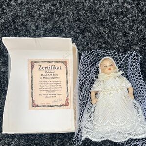 Miniature Baby Doll in White Outfit